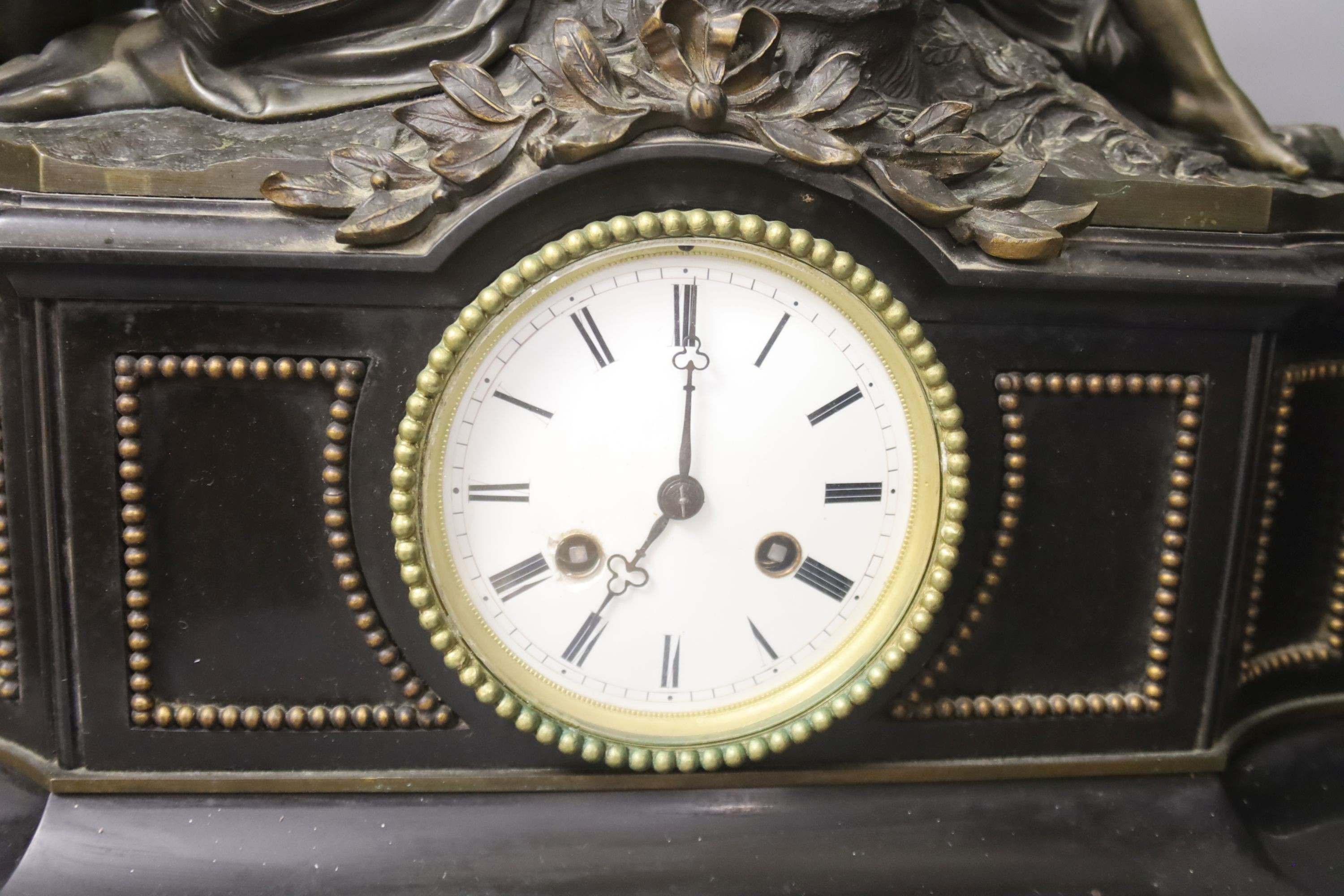 A large 19th century French bronze and black slate mantel clock 52cm